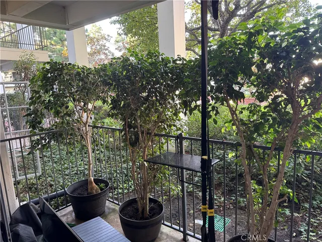 a kitchen with stainless steel appliances granite countertop a refrigerator stove and microwave