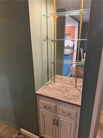 a aerial view of a house with a yard basket ball court and outdoor seating