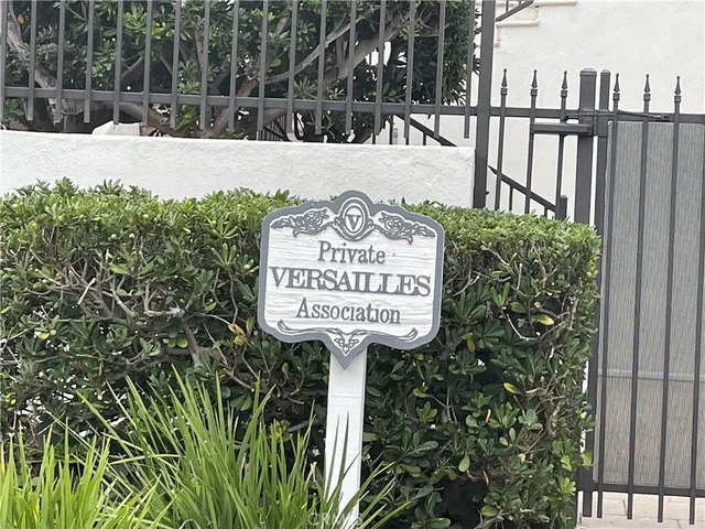 a view of parking with sign board