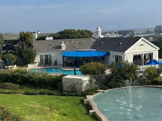 a view of backyard with seating space