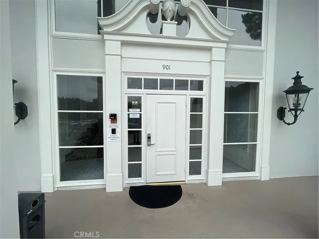 a view of a house with a large window
