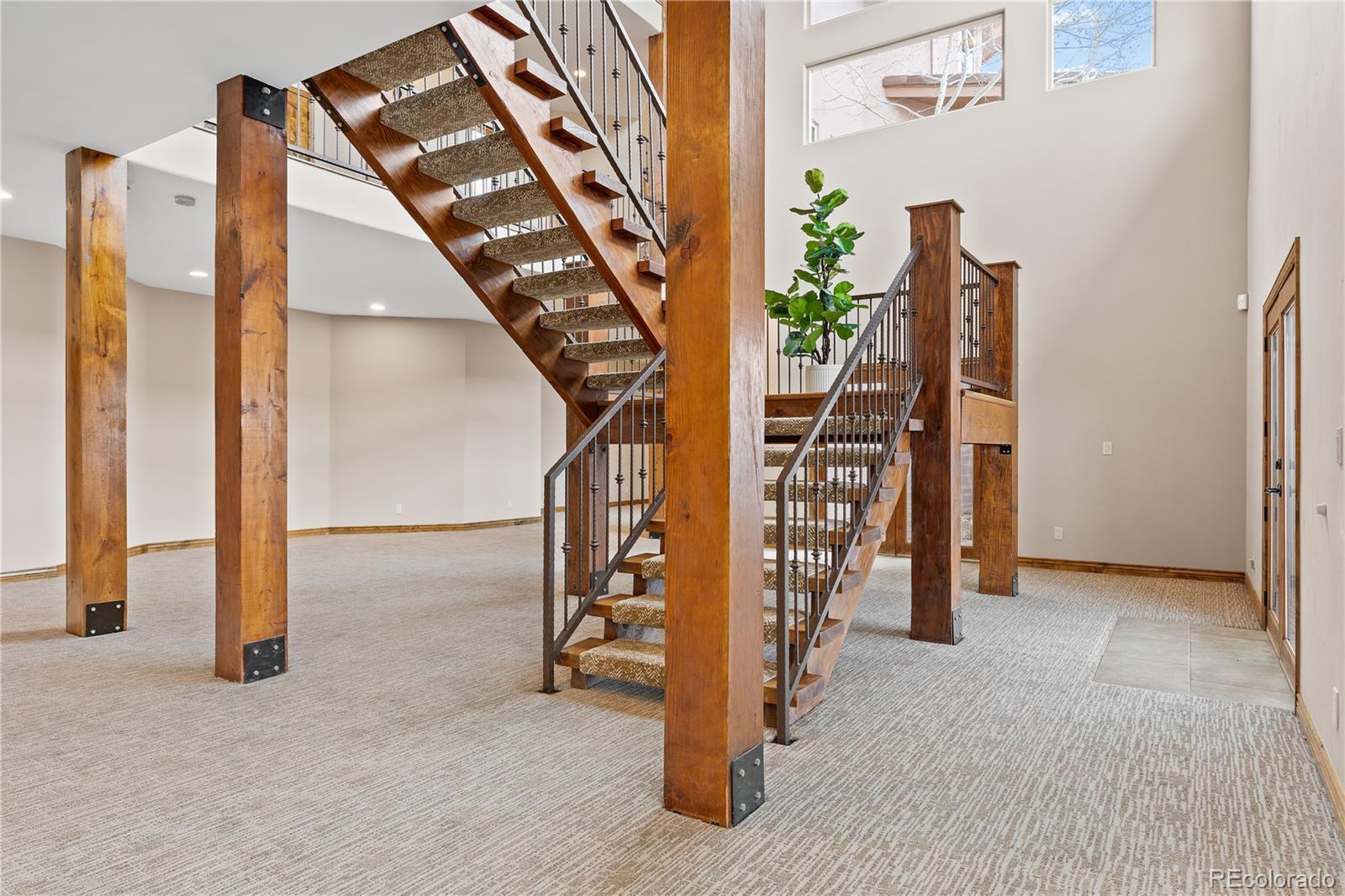 2505 Big Bear Circle Sedalia, CO 80135 - Photo 28 of 50 a view of an entryway with hardwood
