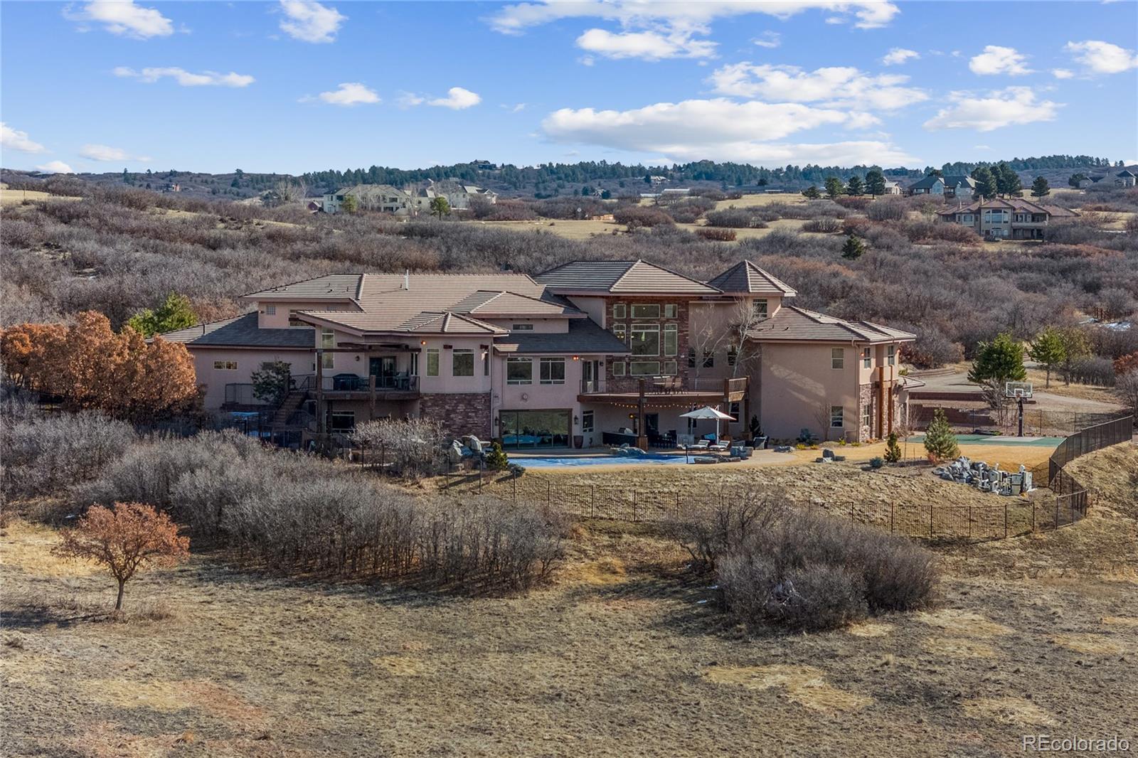 2505 Big Bear Circle Sedalia, CO 80135 - Photo 3 of 50 a view of a town with large trees