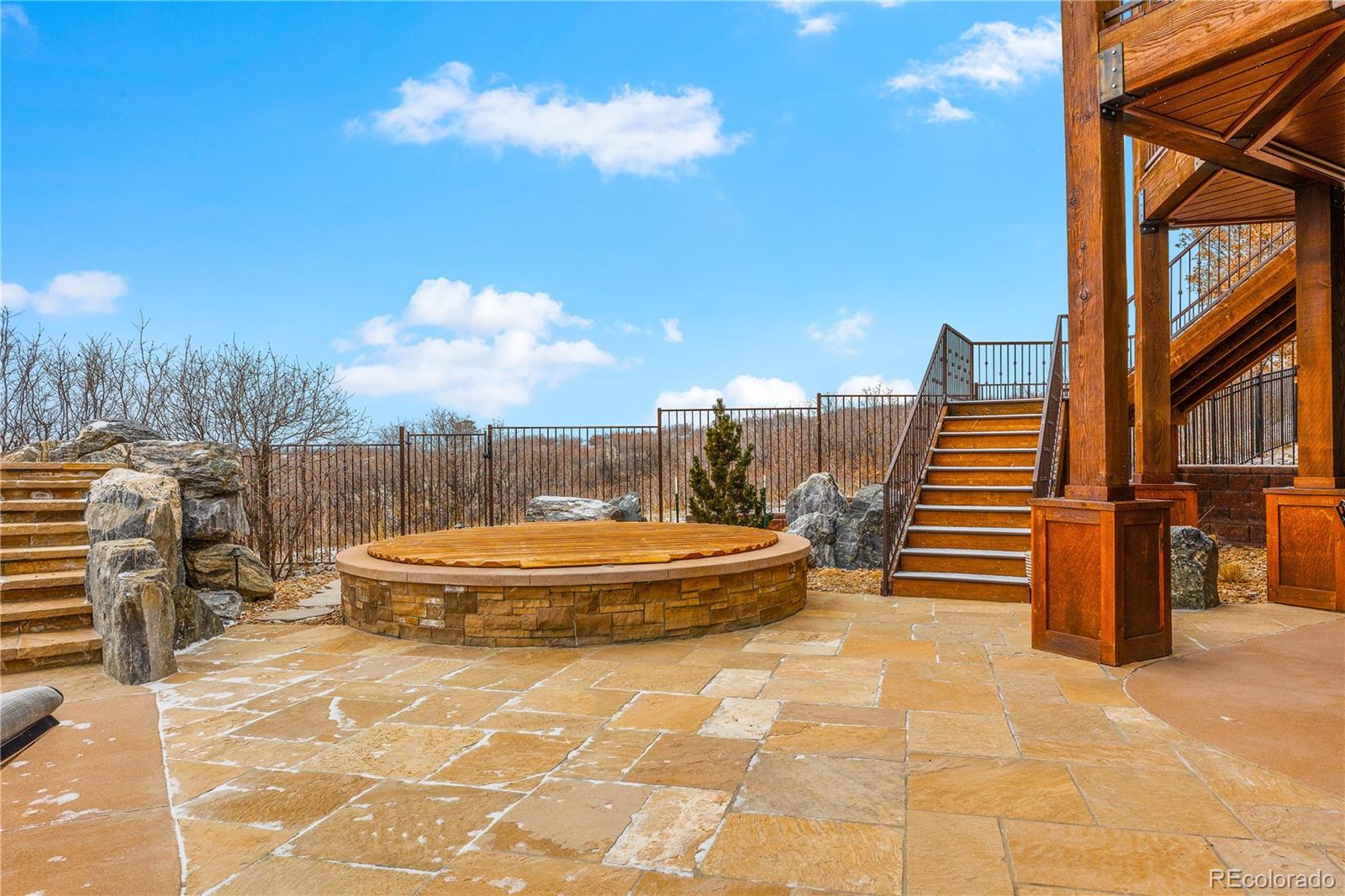 2505 Big Bear Circle Sedalia, CO 80135 - Photo 43 of 50 a view of a balcony with many windows