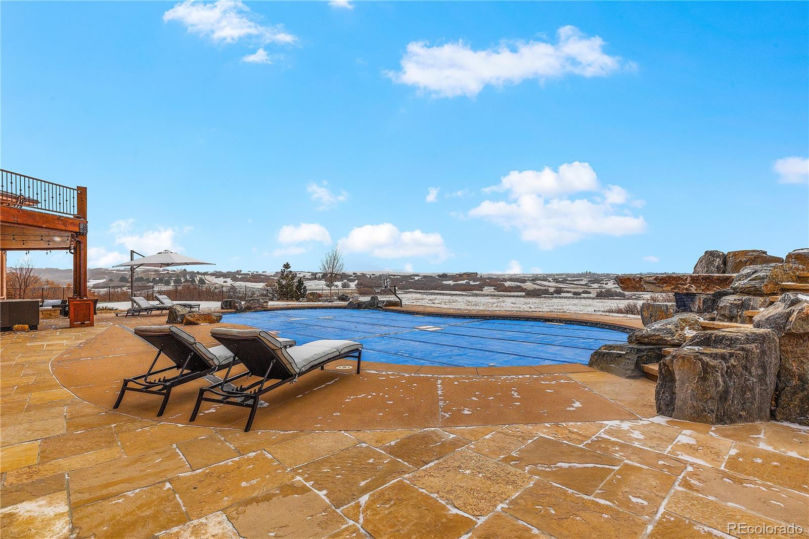 2505 Big Bear Circle Sedalia, CO 80135 - Photo 44 of 50 a view of a terrace with lawn chairs