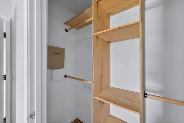 a view of front door with wooden floor