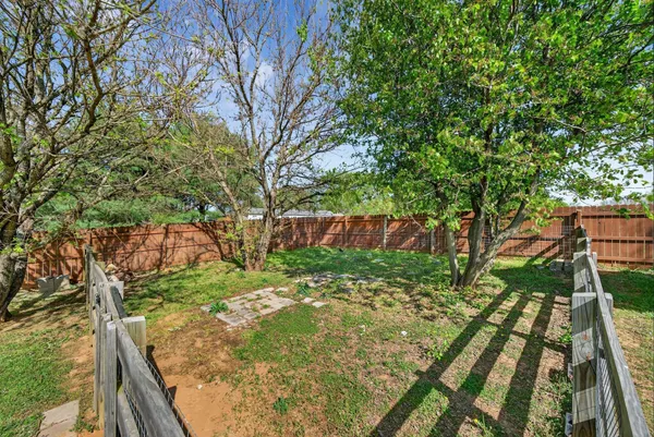 a view of backyard with deck