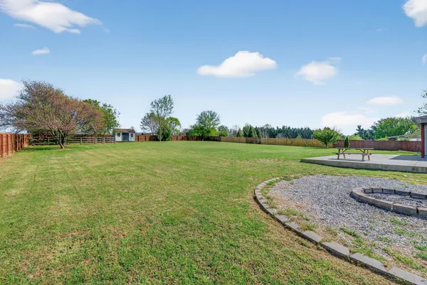 a view of a golf course with a lake