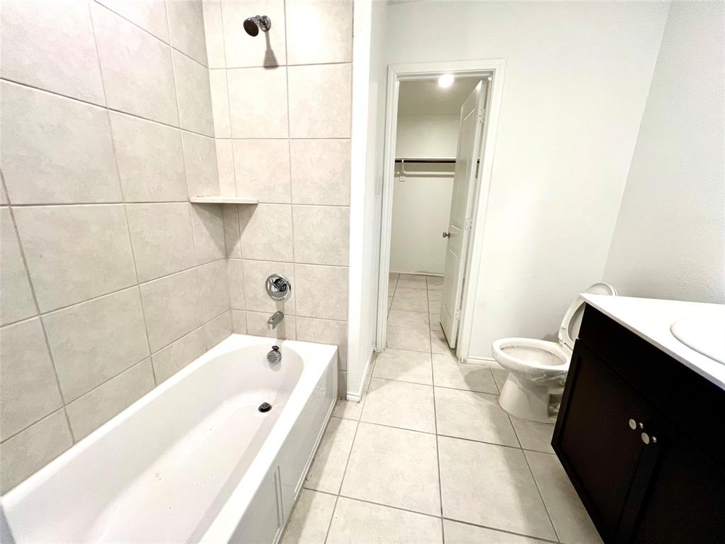 5711 Bristle Leaf Drive Princeton, TX 75407 - Photo 12 of 23 a bathroom with a tub and shower