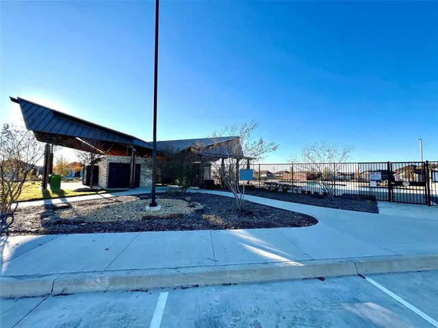 a view of swimming pool with outdoor seating