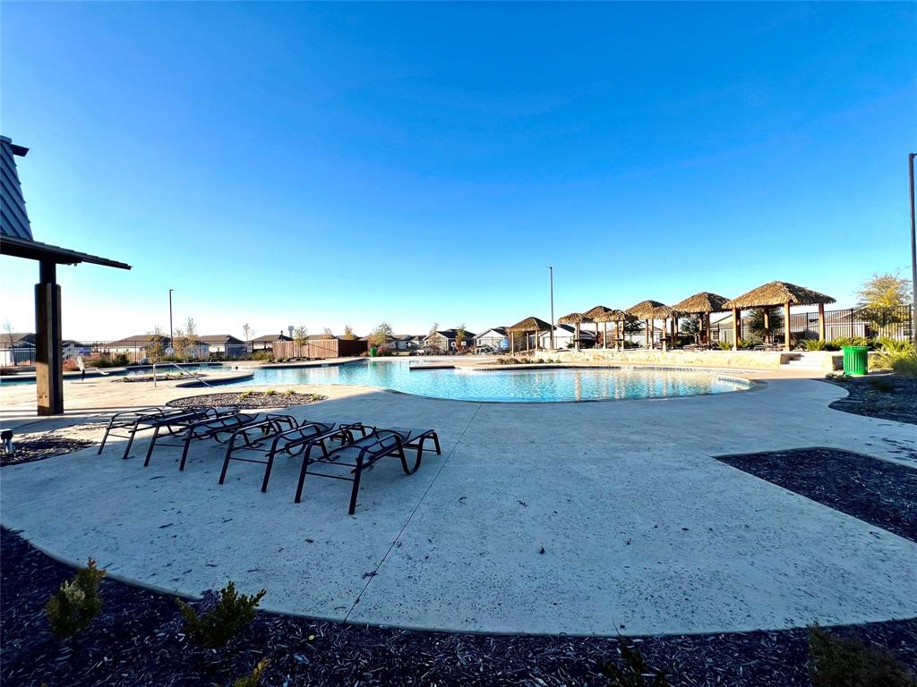 5711 Bristle Leaf Drive Princeton, TX 75407 - Photo 21 of 23 a view of swimming pool with outdoor seating