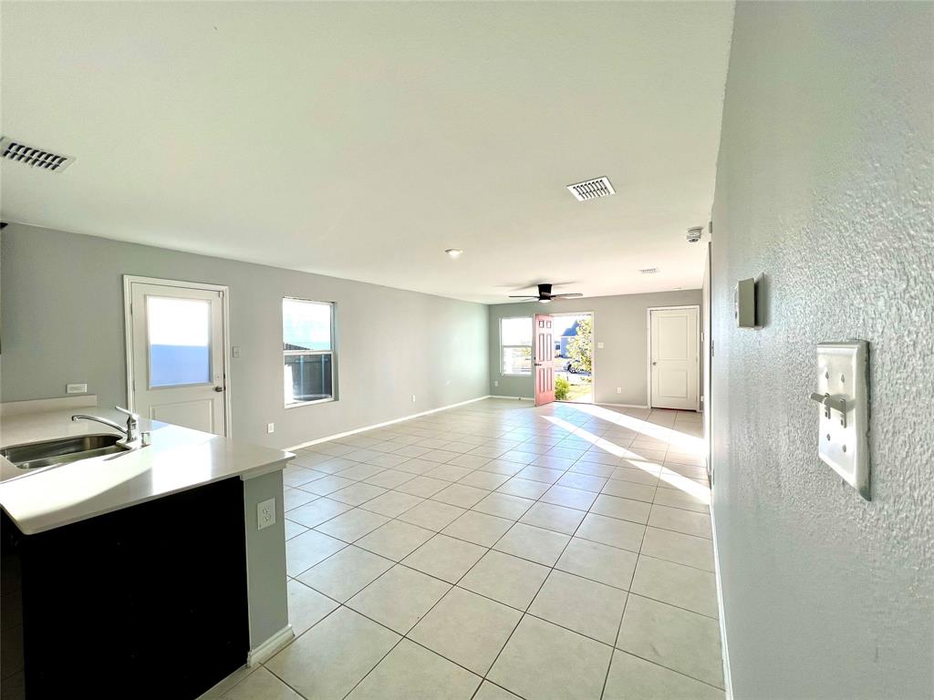 5711 Bristle Leaf Drive Princeton, TX 75407 - Photo 5 of 23 a view of a electric appliances in a room