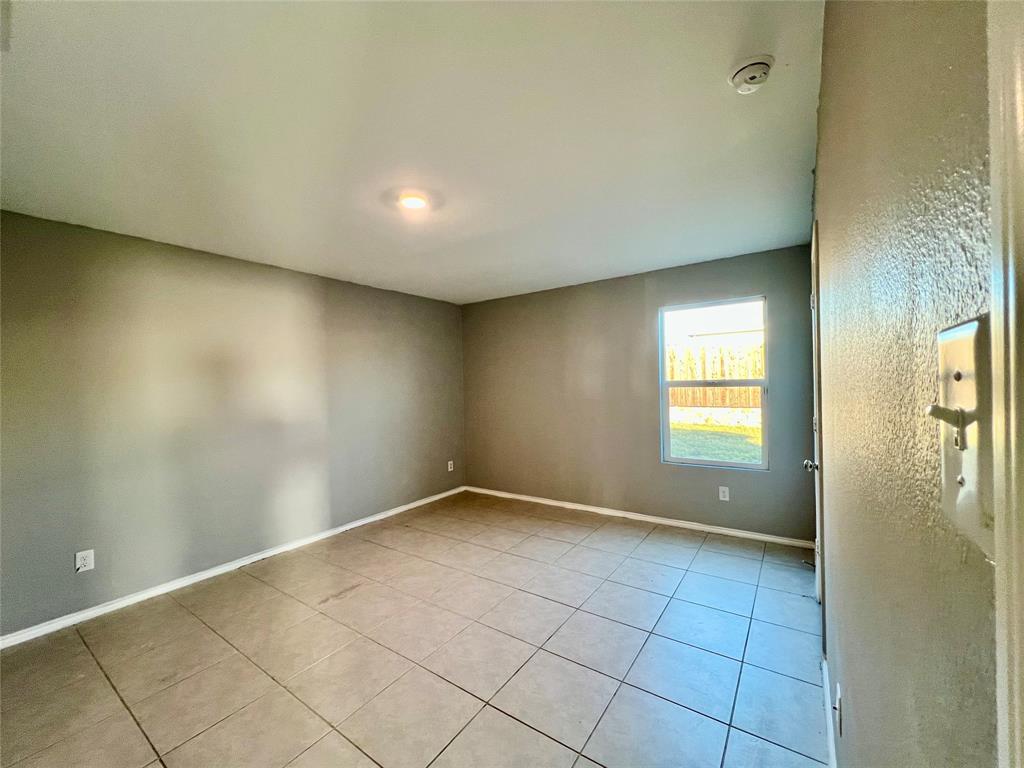5711 Bristle Leaf Drive Princeton, TX 75407 - Photo 10 of 23 a view of an empty room and window
