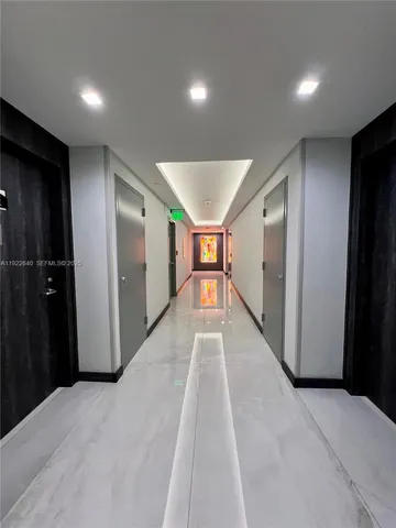 a view of a yard with palm trees