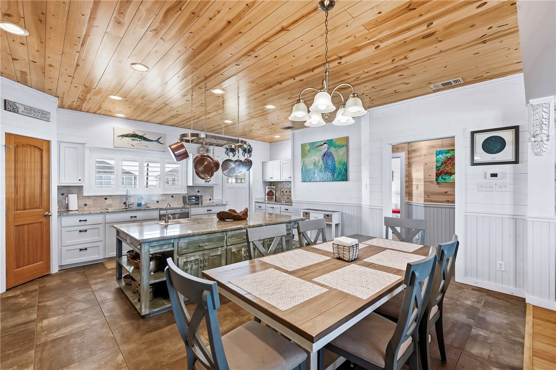 70 Copano Ridge Road Rockport, TX 78382 - Photo 9 of 40 a view of a dining area with furniture