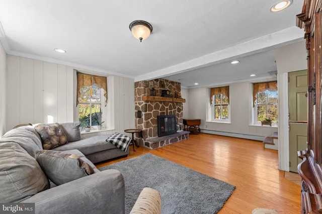 a kitchen with cabinets and refrigerator