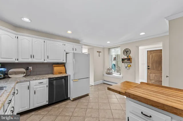 a view of a livingroom with furniture and window