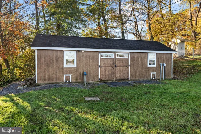 a view of kitchen with wooden floor and window