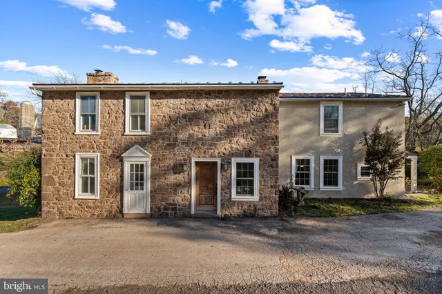 a view of a house with a garden