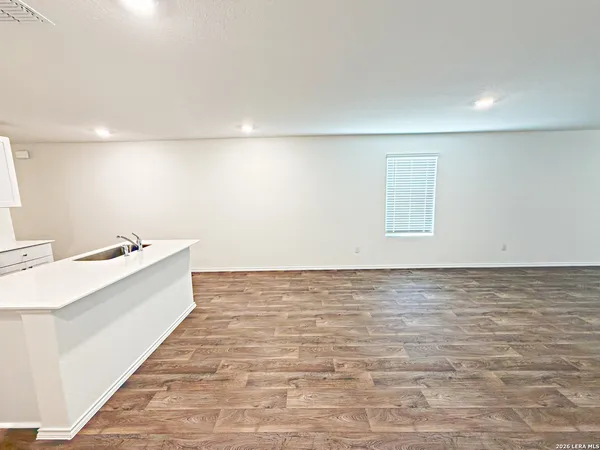 a view of a kitchen with empty room