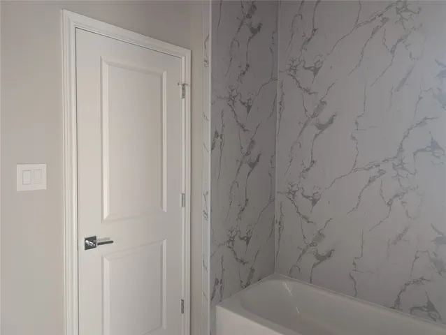 a bathroom with a bathtub