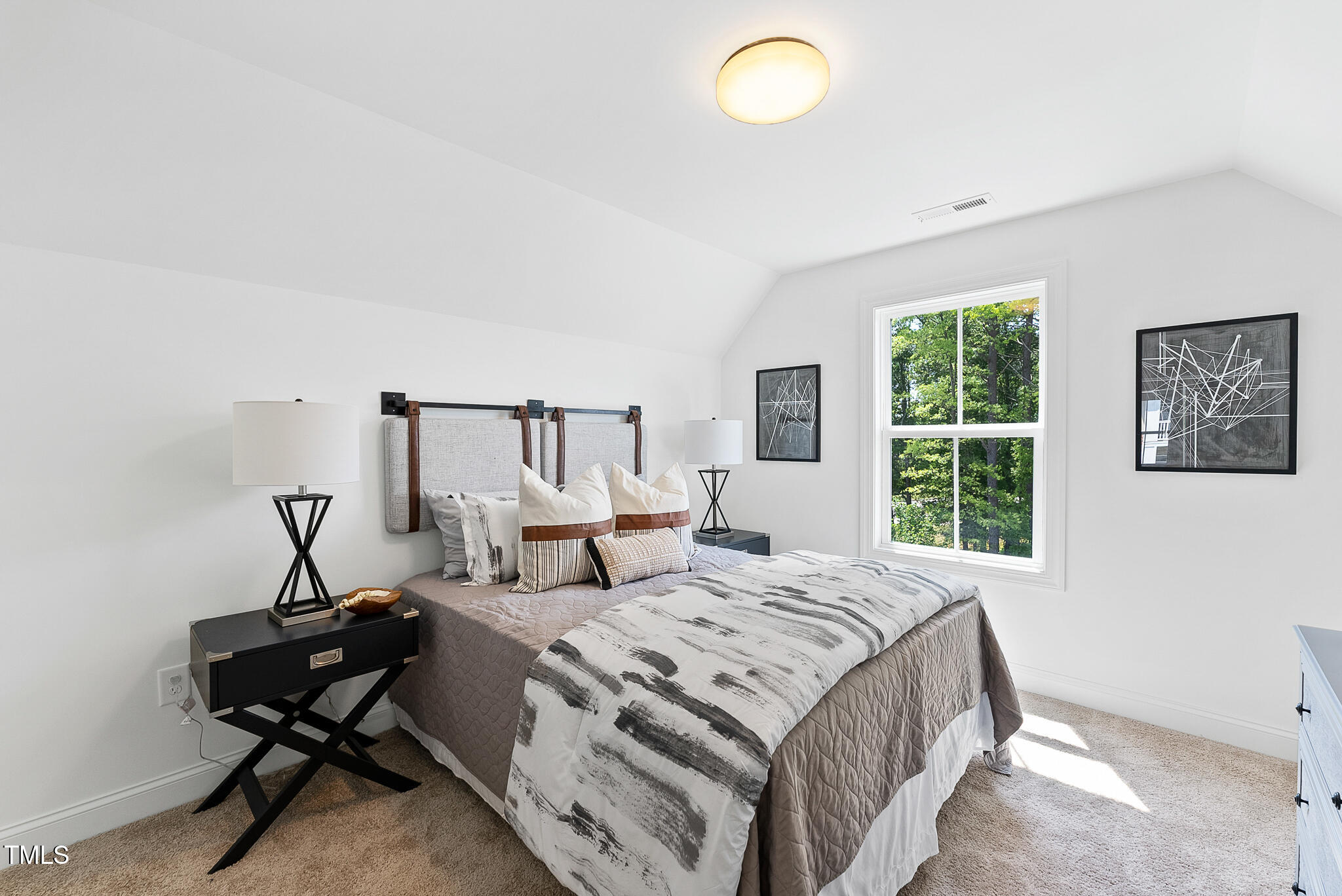 4810 Gossamer Lane, Unit 105 Raleigh, NC 27616 - Photo 18 of 42 a bedroom with a bed and a window