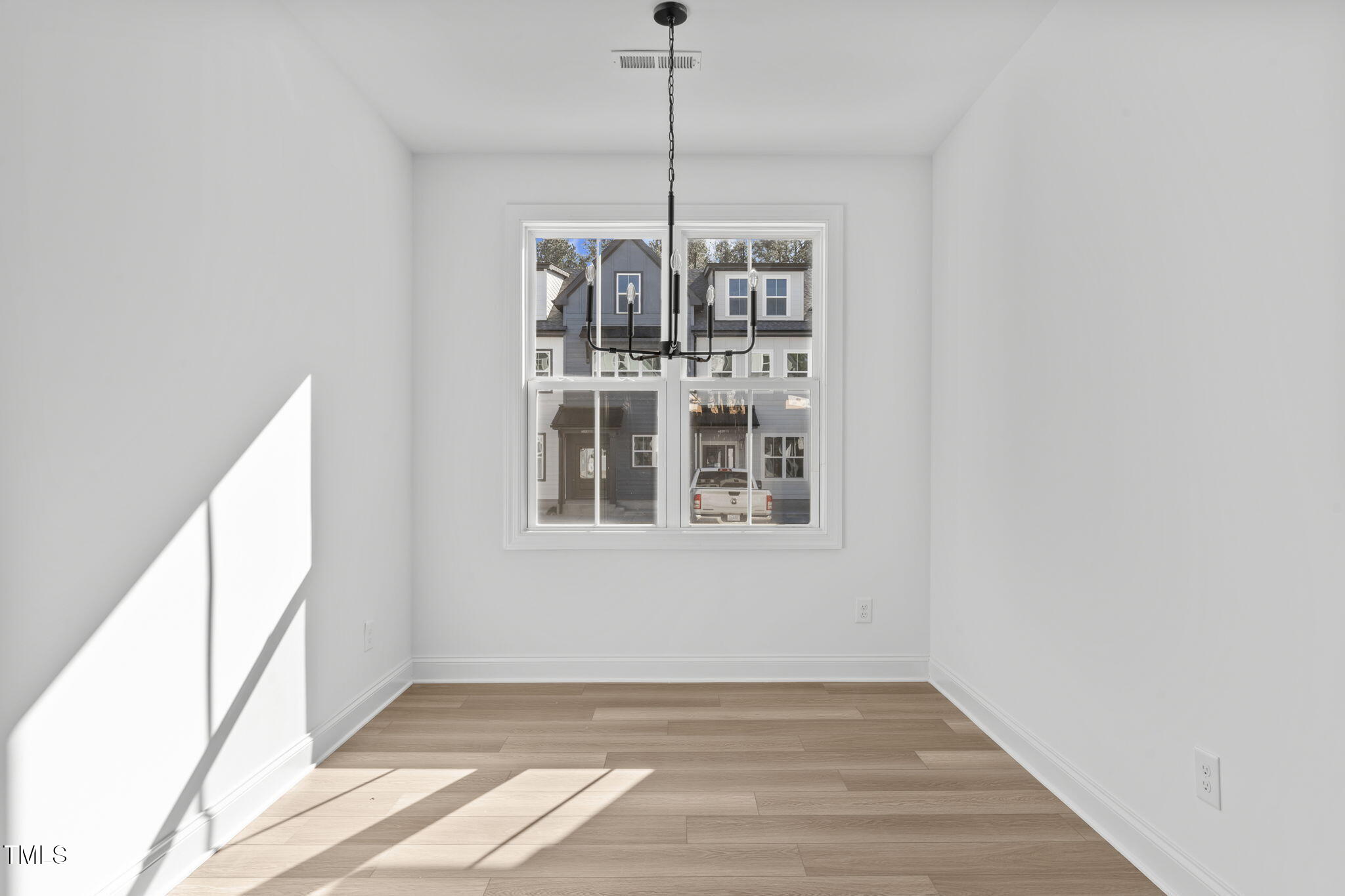 4810 Gossamer Lane, Unit 105 Raleigh, NC 27616 - Photo 10 of 42 a view of a room with windows