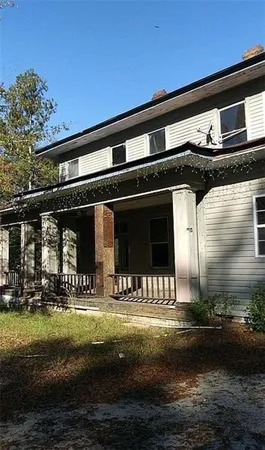 a front view of house with yard