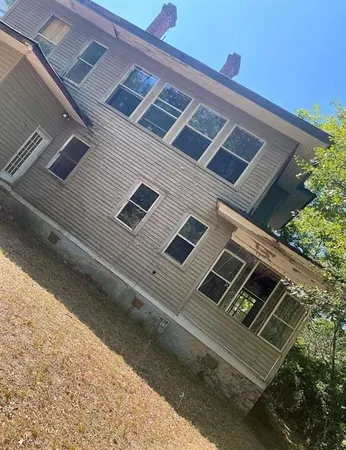 a view of a house with a large space