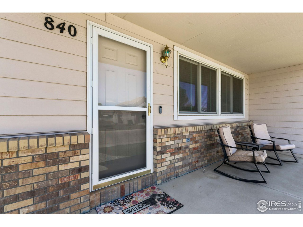 840 East 4th St Road Eaton, CO 80615 - Photo 3 of 20 Covered front porch.