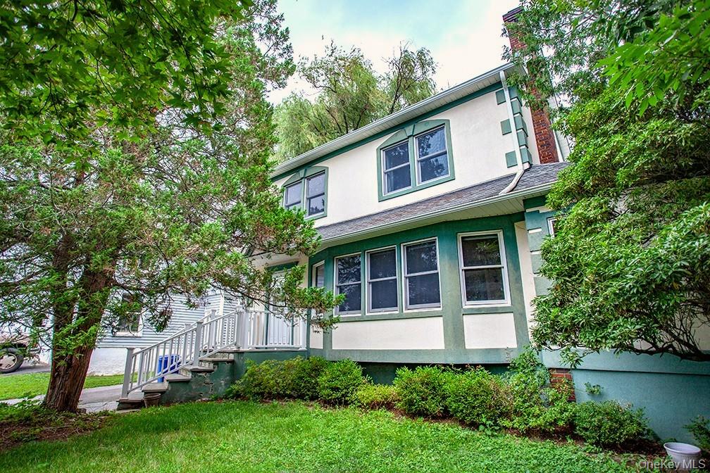 Front of the house with living room windows