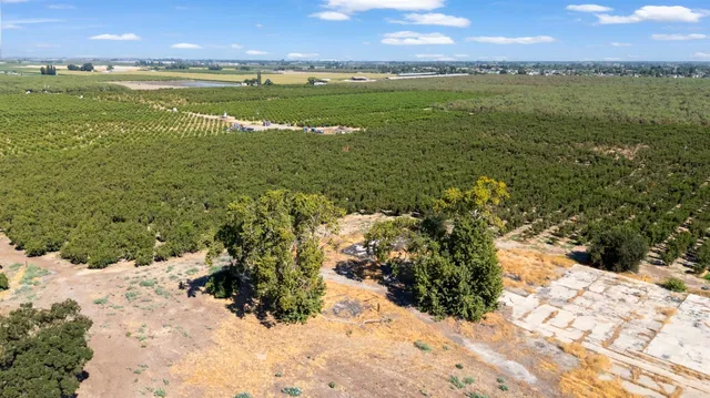 a view of an ocean and a yard
