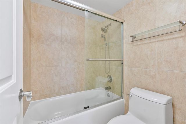 a sign that is next to a road