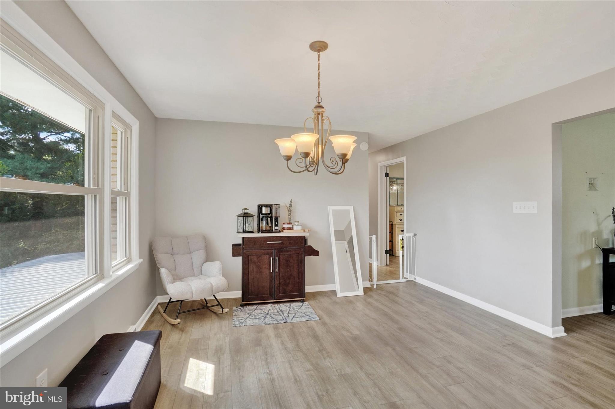 5840 Old Carlisle Road Dover, PA 17315 - Photo 9 of 31 a view of a dining room with furniture window and wooden floor