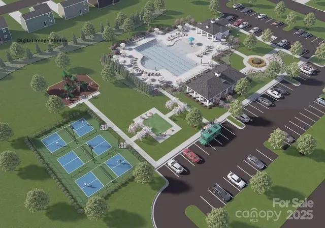 an aerial view of a house with a lake view