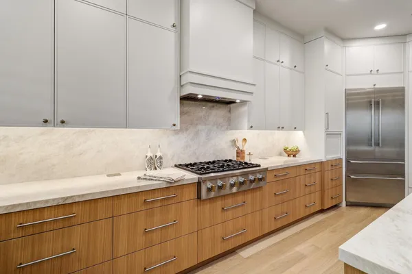 a spacious bedroom with a bed and window