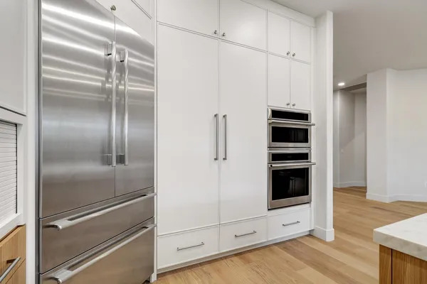 a bedroom with bed and window