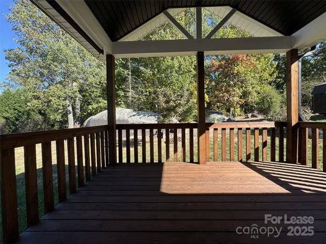 a balcony view with a garden space