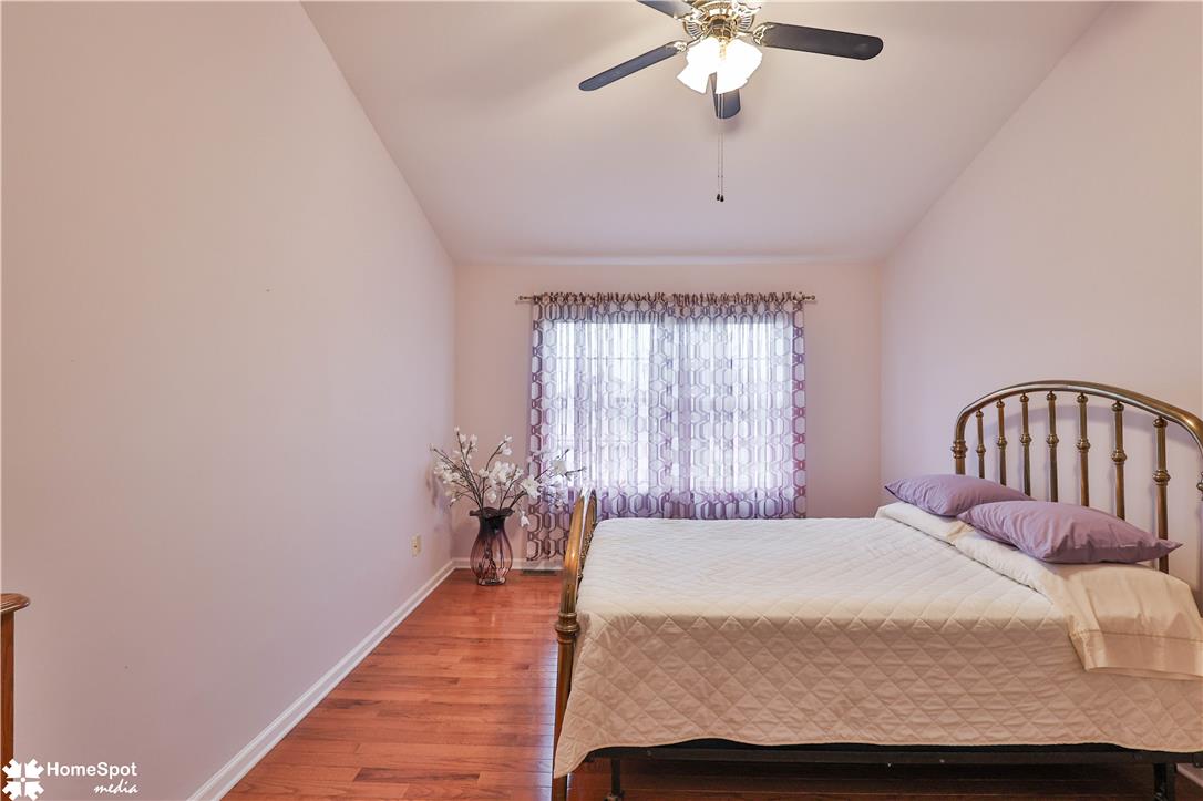 507 Howertown Road Northampton, PA 18067 - Photo 20 of 46 Hardwood floors and a vaulted ceiling elevate this comfortable primary bedroom.