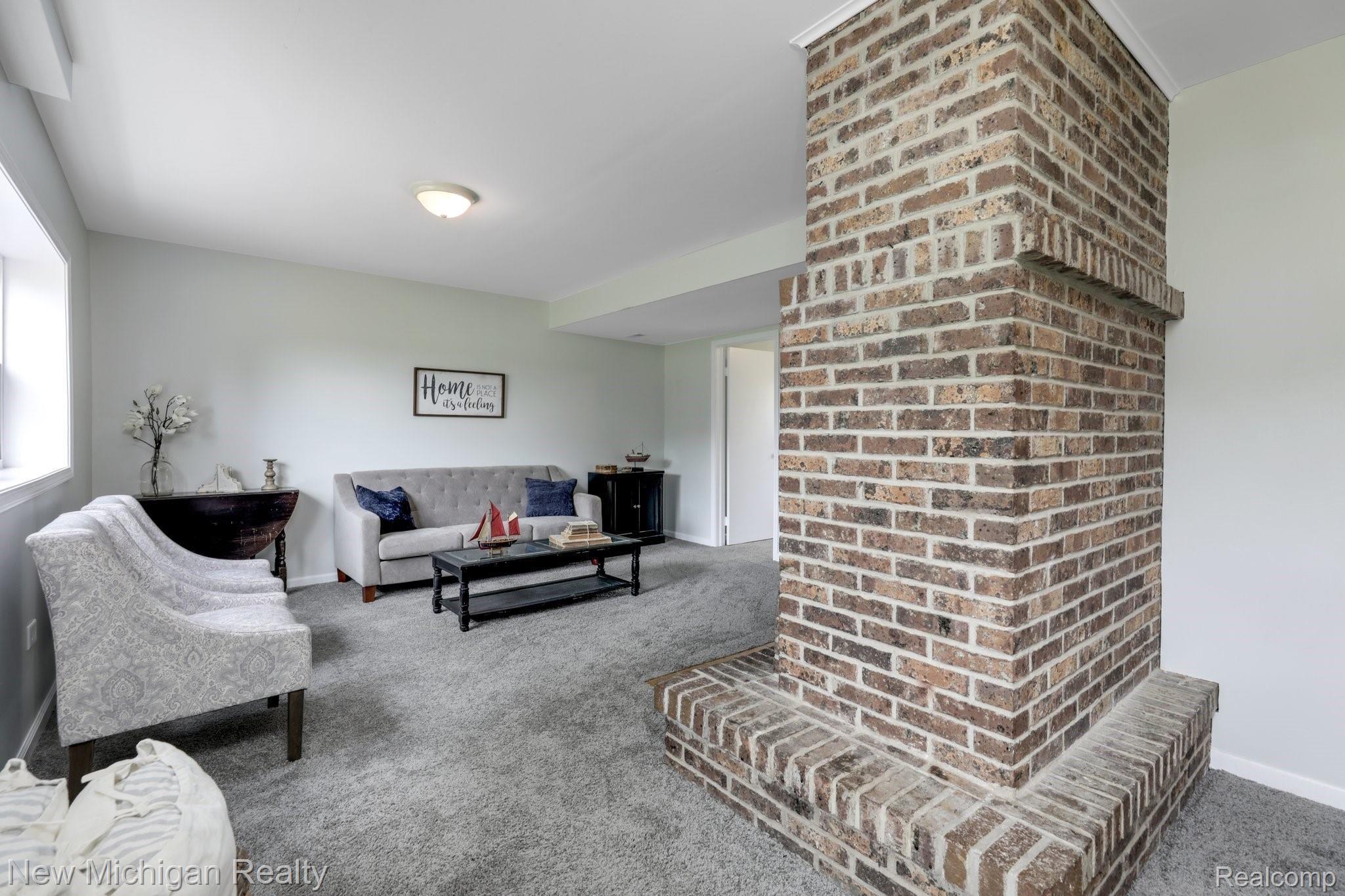 3589 North Mill Road Dryden, MI 48428 - Photo 26 of 42 Large Level Family Room with Fireplace