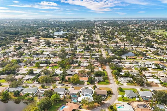 an aerial view of residential building with parking space