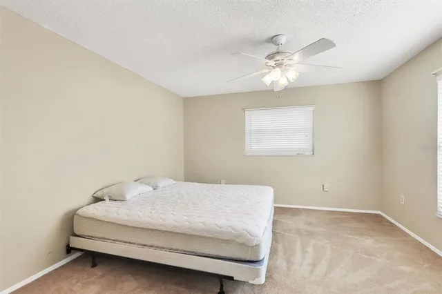 an aerial view of residential building with parking space