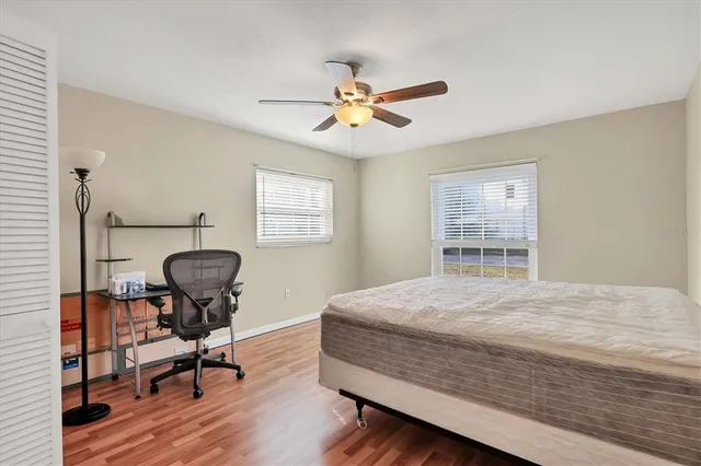 a street sign on a pole on a street