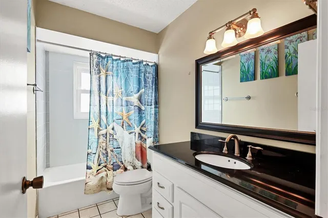 an aerial view of residential building with parking space