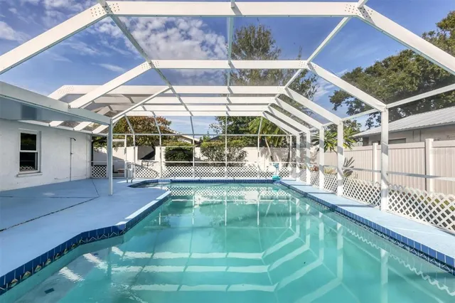 a sign that is sitting in front of a house