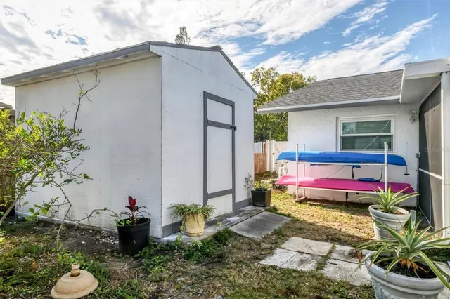 a view of a lake with a yard