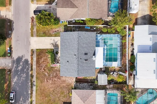 a view of a lake with a yard