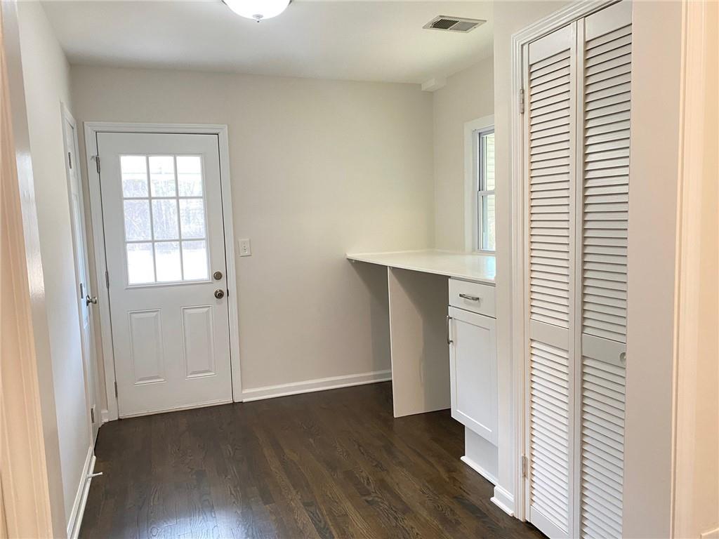 330 Community Drive Mableton, GA 30126 - Photo 26 of 47 an empty room with wooden floor and windows