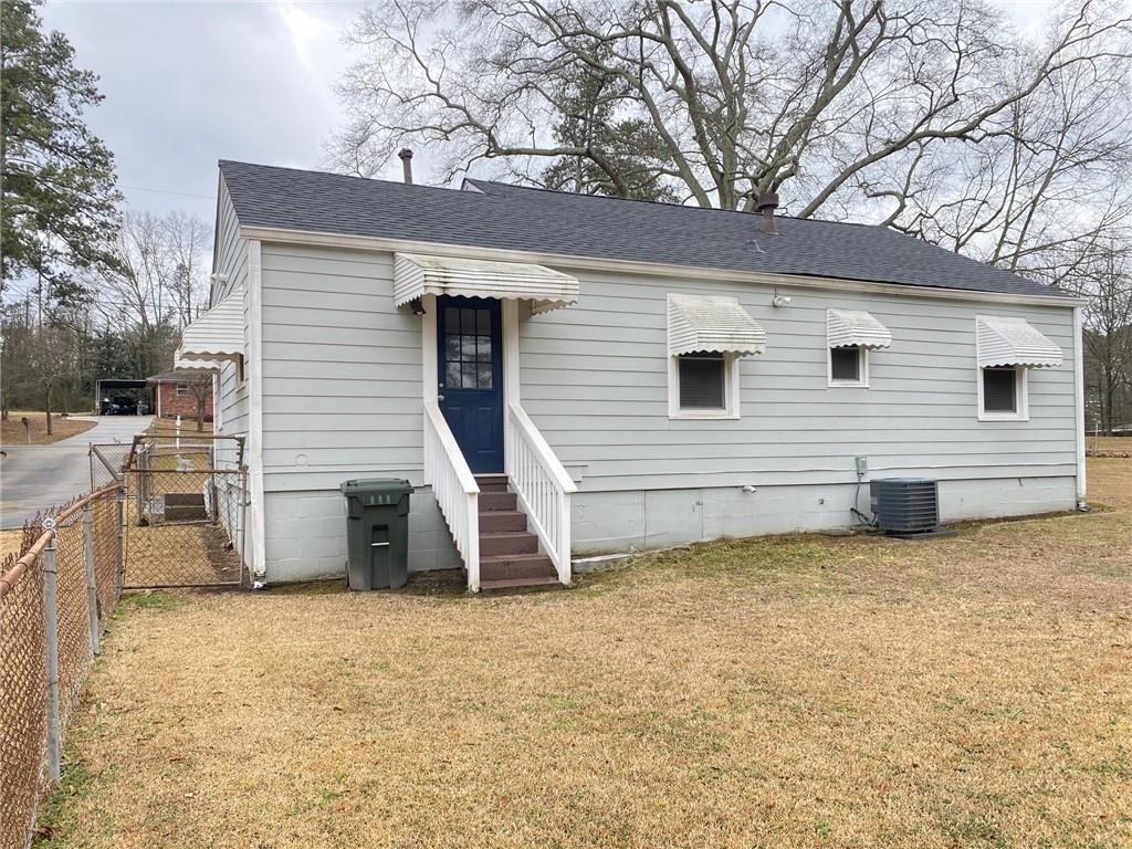 330 Community Drive Mableton, GA 30126 - Photo 38 of 47 a view of a house with a backyard