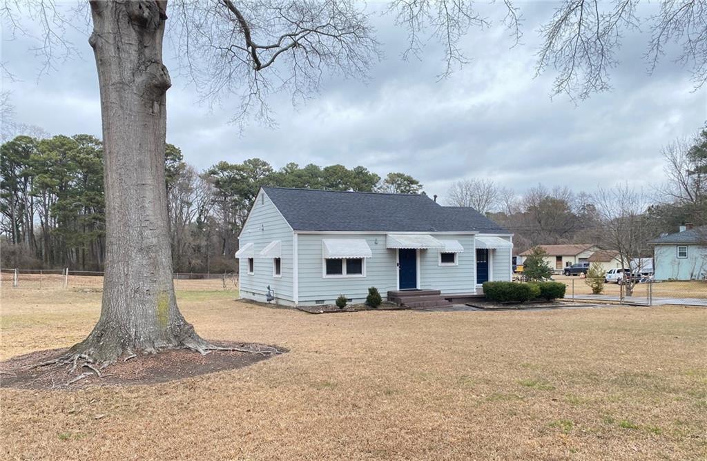 330 Community Drive Mableton, GA 30126 - Photo 5 of 47 a view of a house with a yard